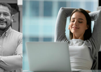 Mujer ejecutiva sentada frente a su laptop con una expresión de calma y relajación